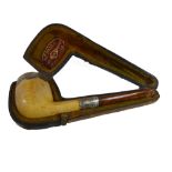 A cased silver-mounted meerschaum pipe by WH Newman