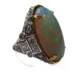 A large opal and diamond-set 18-carat gold ring