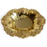 A large 24-carat gold-plated fruit bowl