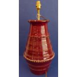 A sang-de-boeuf glazed Art Pottery style lamp-standard of tagine form (50cm including brass