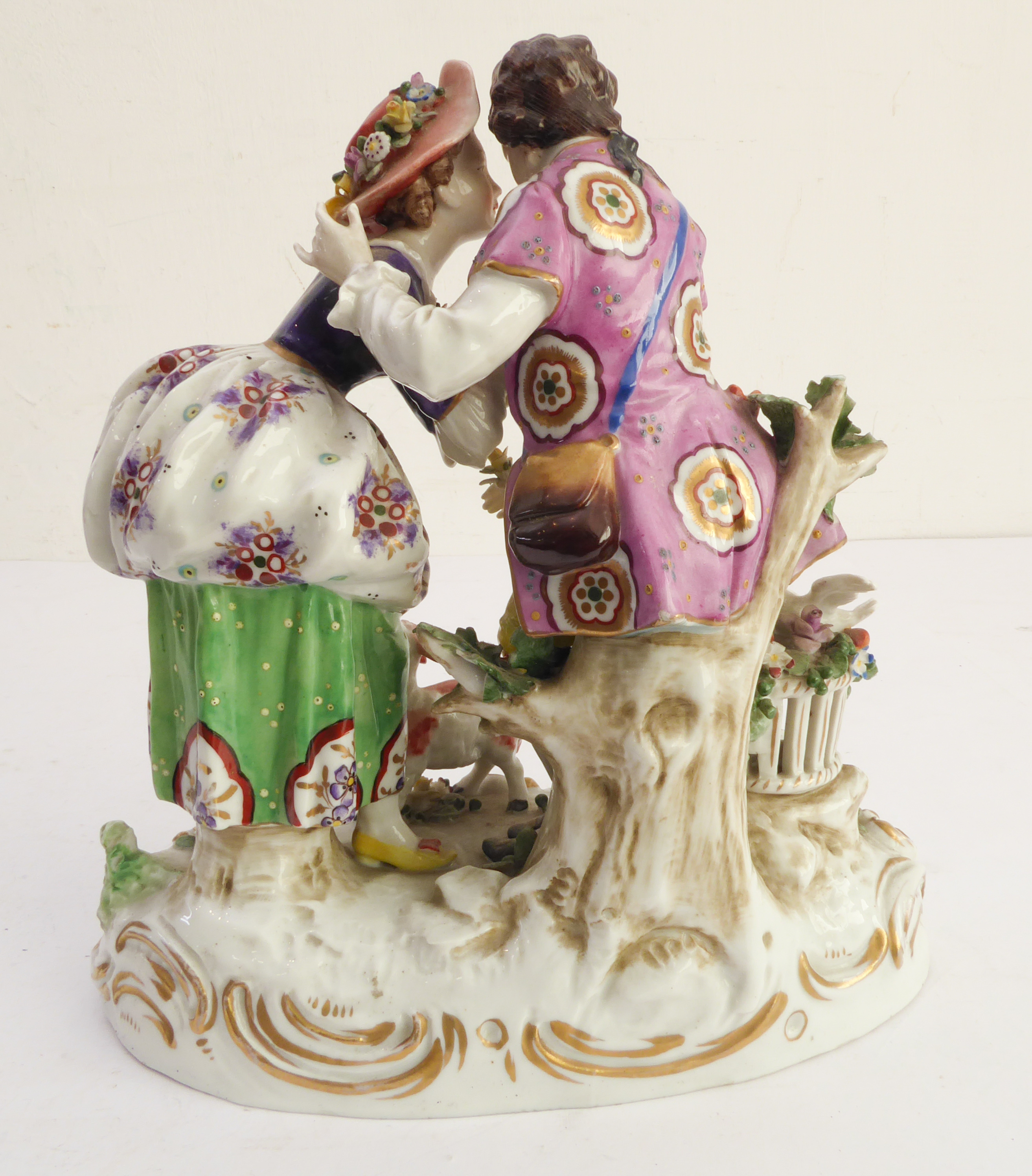 A hand-decorated late 19th / early 20th century Naples porcelain figure group - the female receiving - Image 4 of 7