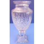 A large and heavy hand-cut clear-glass vase of baluster form - diamond-cut body above a stepped