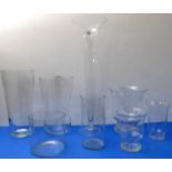 Eight large and modern clear-glass vases of differing shapes - the tallest 78.5cm high, conical-