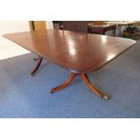 A Regency-style extendable mahogany dining table: newly repolished top with reeded edge and