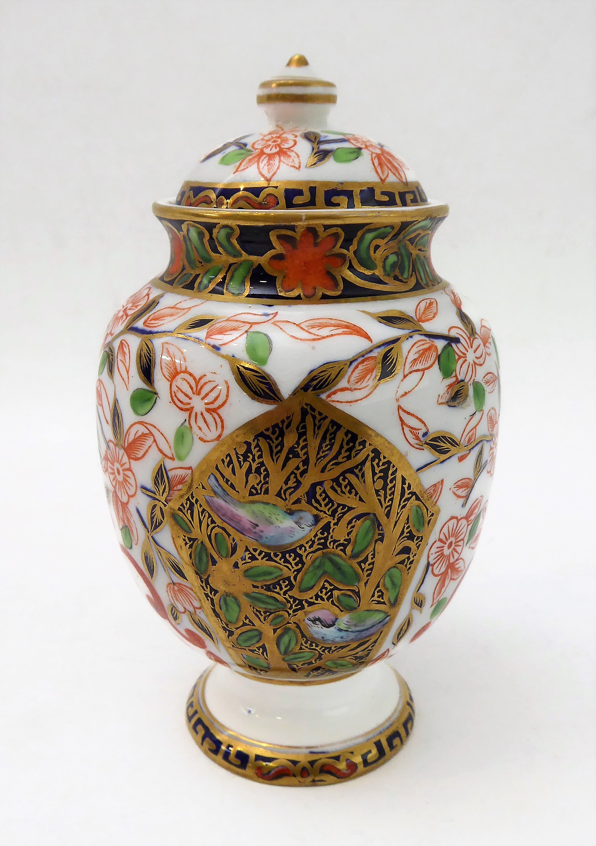 A small 19th century Crown Derby porcelain vase-and-cover decorated in the Imari pattern (13cm