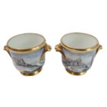 A pair of miniature Sèvres porcelain cachepots: hand-decorated scenes of chateaux; hand-gilded rims,