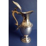 A fine Sheffield plated hot water jug in neo-classical taste – hinged lid with pineapple-type finial