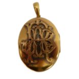 A 19th century oval two tone rose and yellow gold coloured photograph locket of very fine quality;