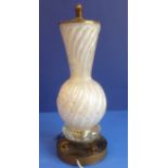 An unusual early/mid 20th century brass mounted and glass table lamp; vase-shaped wrythen glass main