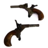 Two miniature Flobert Model 500 blank pistols - one functional, the other without its swivel