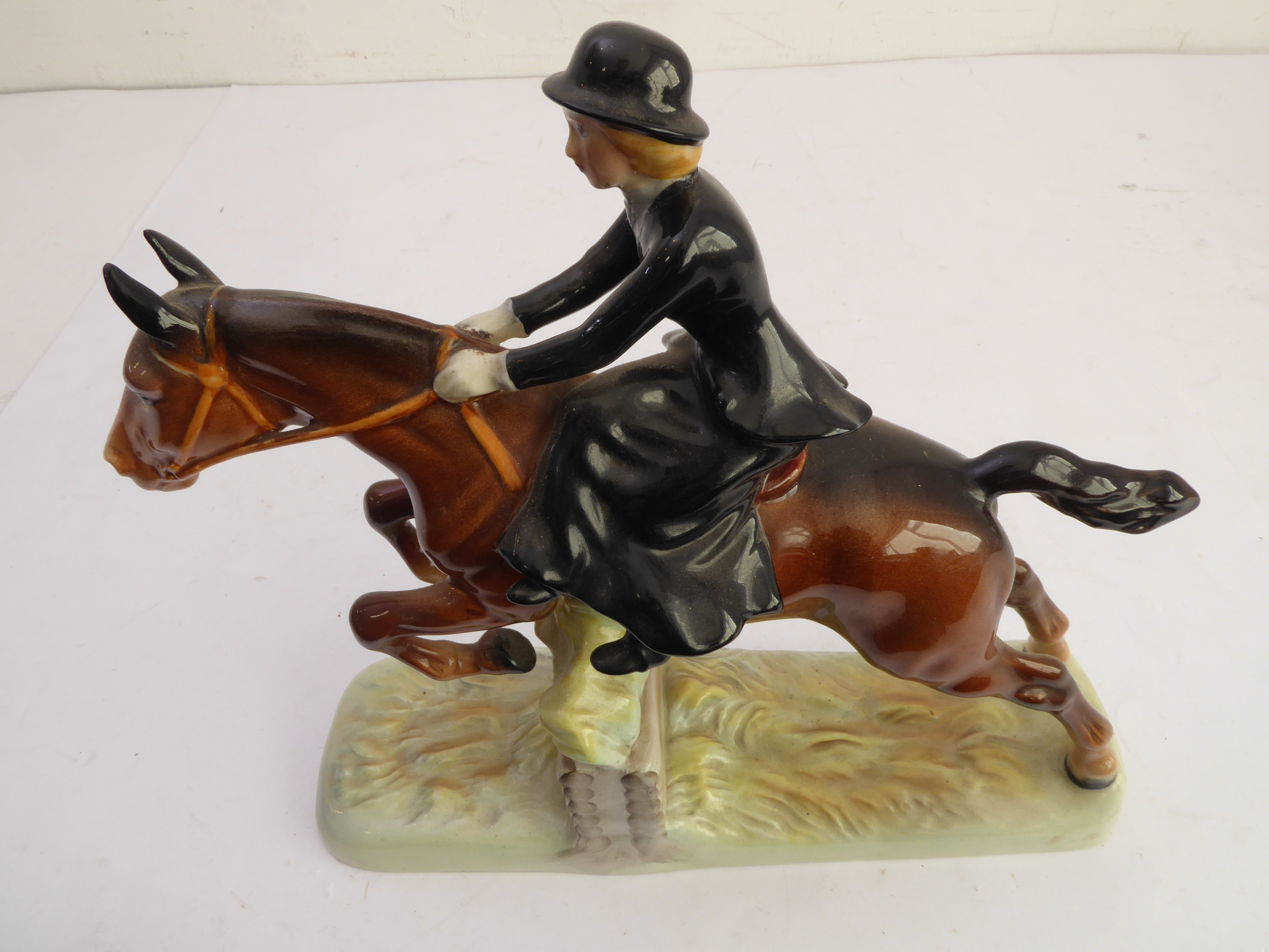 A hand-decorated Beswick model of a lady jumping a six-log fence side-saddle - printed and painted - Image 3 of 5