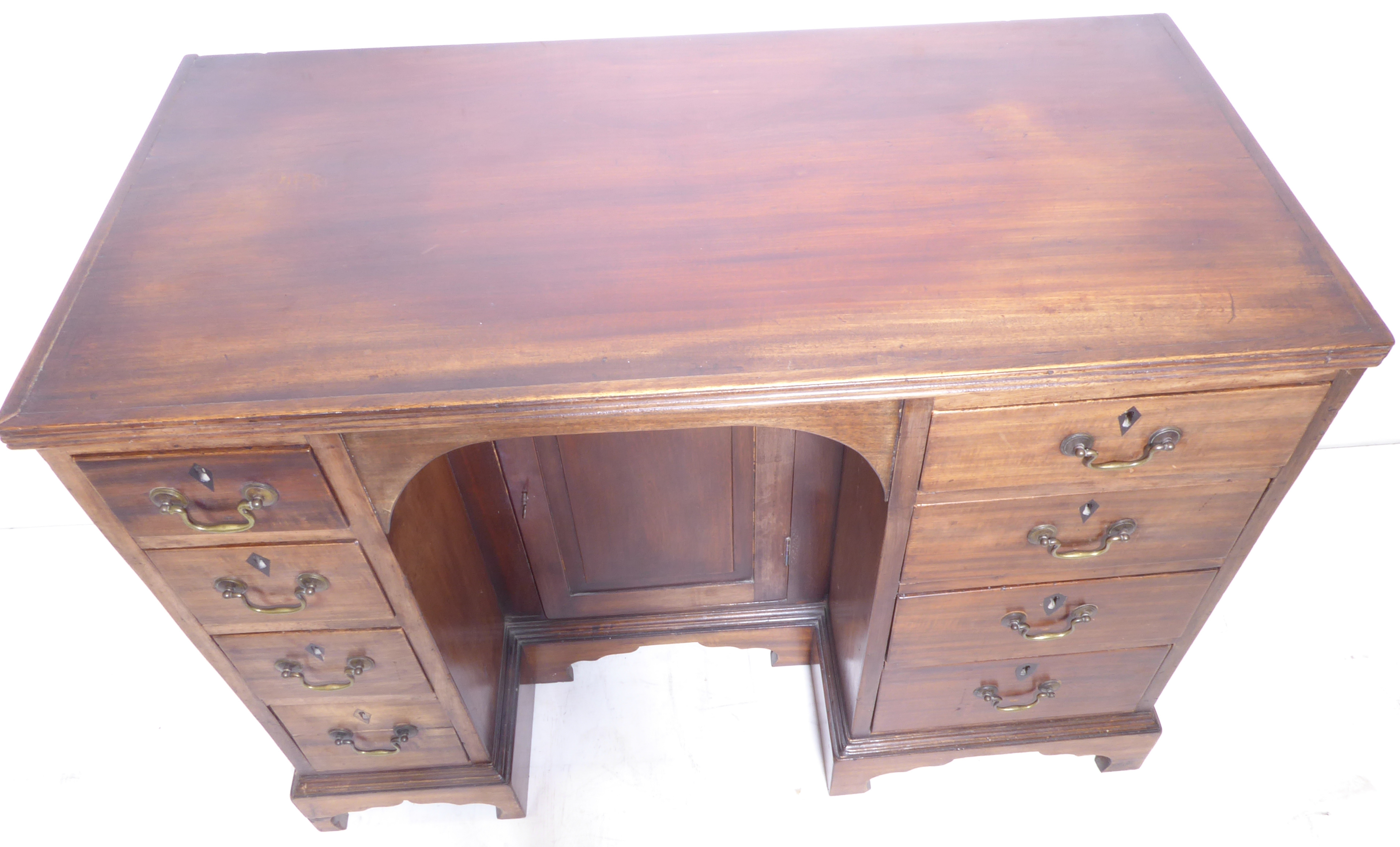 An early 19th century George III period mahogany knee-hole desk - the reeded edge top above recessed - Image 2 of 4