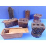 A good selection of roughly hewn and patinated Indian treen; to include three triple candleholders