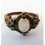 An opal and turquoise-set dress ring stamped '9CT'