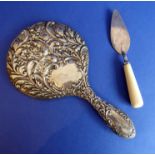 An early 20th century Edwardian hallmarked silver lady's dressing table hand-held mirror (assayed