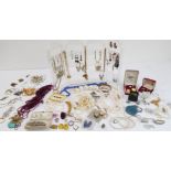 An assortment of jewellery and costume jewellery to include: three freshwater cultured pearl