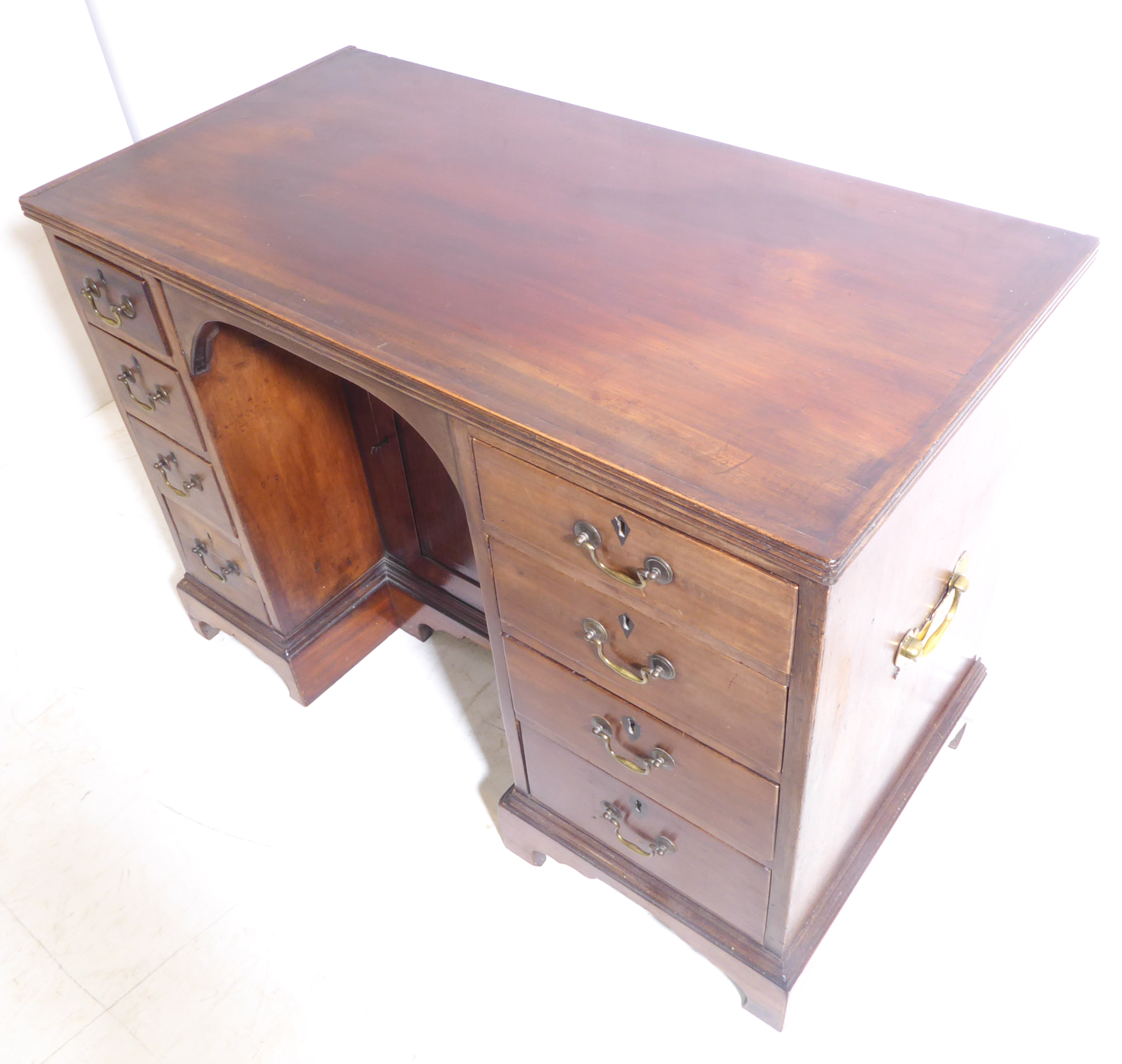 An early 19th century George III period mahogany knee-hole desk - the reeded edge top above recessed - Image 4 of 4