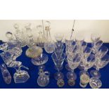 A selection of glassware to include 6 decanters, a set of 8 hand-cut wine glasses with circular