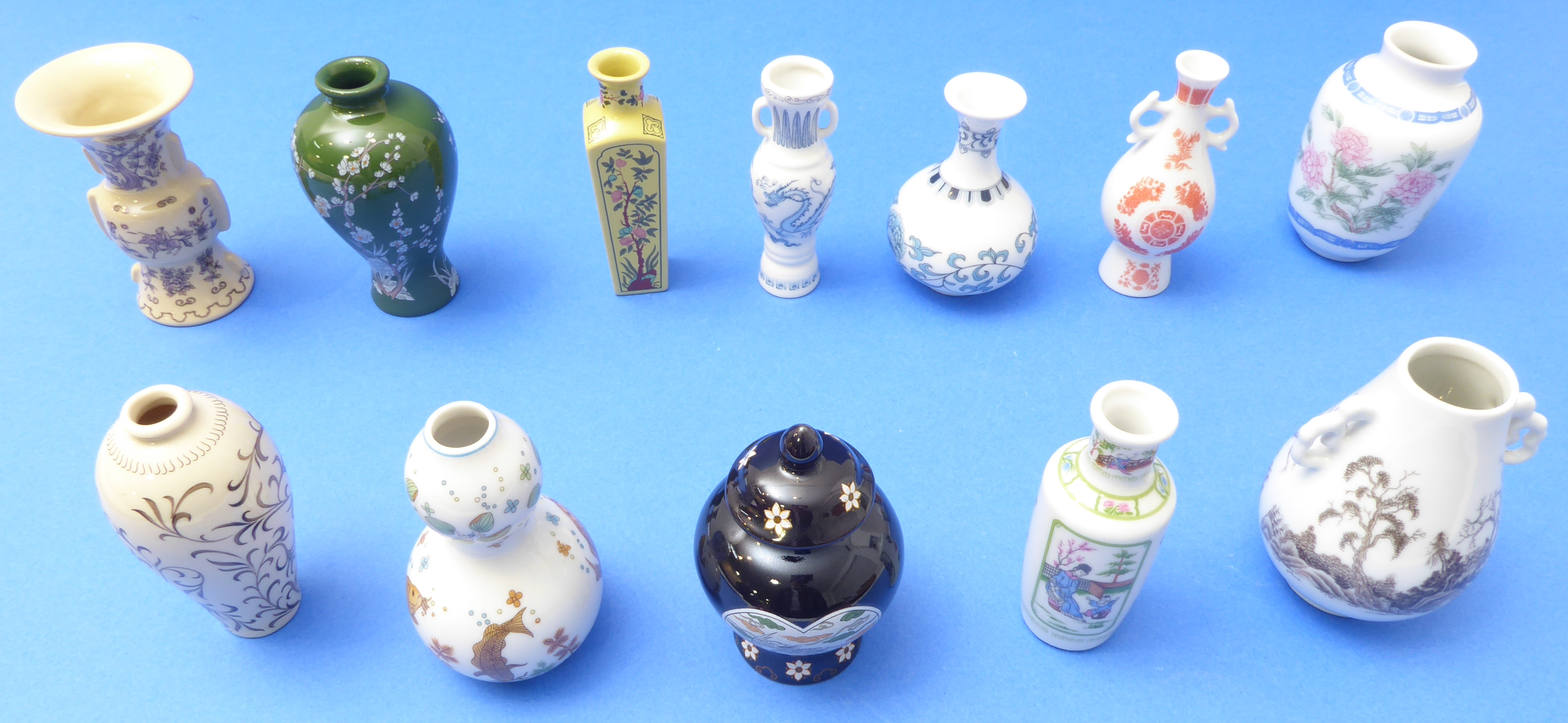 A selection of twelve miniature Chinese porcelain vases in the Chinese style to include rouleau