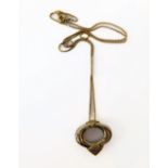 An 18-carat gold 'Saudi' diamond-set pendant and chain