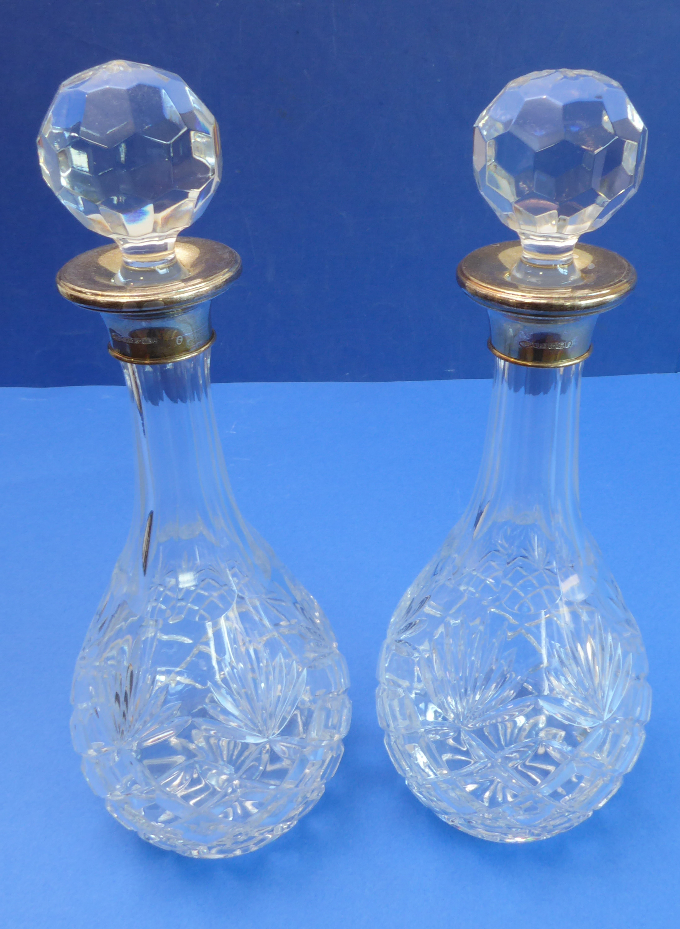 A pair of modern cut-glass club-shaped decanters; each with hallmarked silver-mounted collar (31.5cm - Image 3 of 4