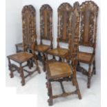 A set of six, probably 19th century, carved walnut high-back chairs in late 17th century style: