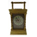 A fine 19th century heavy gilt-metal carriage clock - the cream enamel dial with Arabic numerals