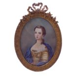 A late 19th / early 20th century portrait miniature signed 'Verné: female blue-eyed subject in her