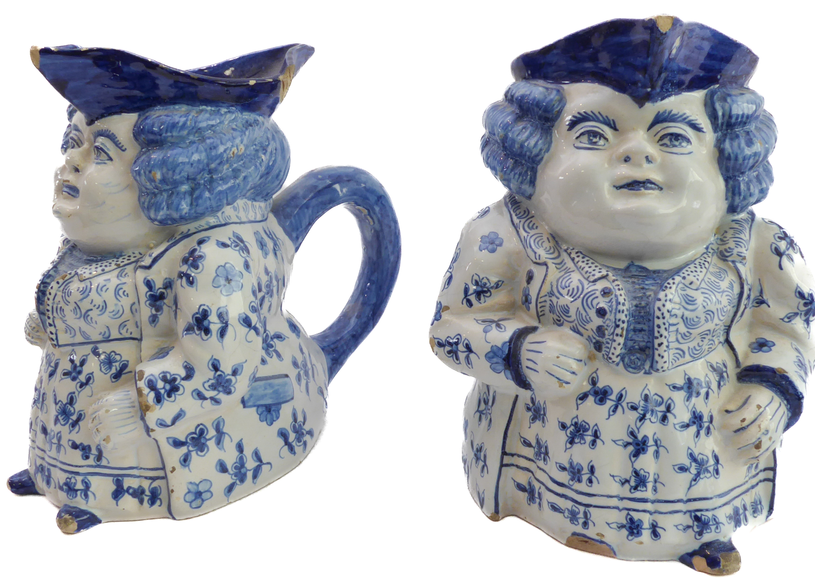 A pair of Delftware Toby jugs  - probably late 19th or early 20th century, modelled as corpulent