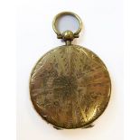 A large 19th century circular gilt-metal photograph locket - suspension loop above a Maltese-style