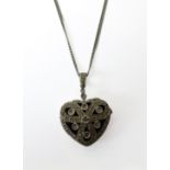 A 9-carat white gold diamond-set heart locket and chain