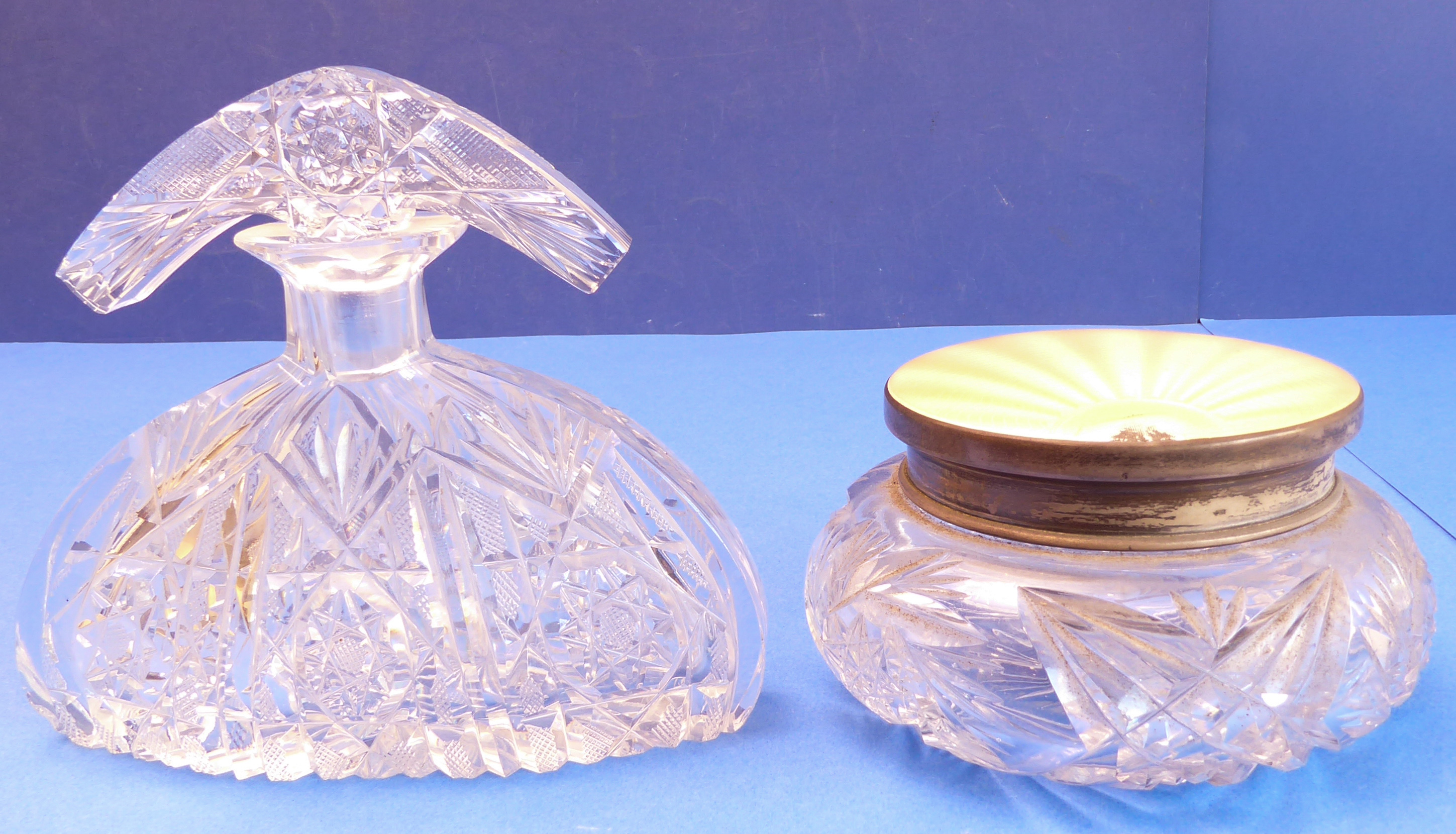 A mid-20th scent bottle and a dressing-table requisite-jar: 1. a stylish mid-20th century hand-cut