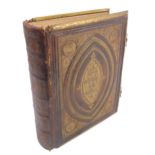 A gilt-tooled leather-bound and gilt-metal-mounted Bible: 'Brown's Self-Interpreting Family Bible