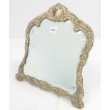 A hallmarked sheet silver easel-style lady's dressing table mirror - central vacant cartouche, in