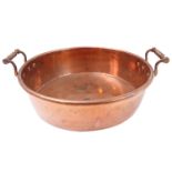 A 19th century two-handled copper preserve pan (35.5cm diameter)