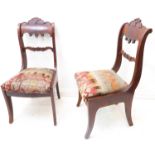 An unusual pair of early 19th century, late Regency period, mahogany salon chairs - figured mahogany
