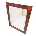 A late 19th century looking glass for restoration; the mahogany frame with chevron banding and