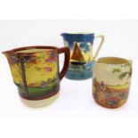 Three Royal Doulton Series Ware polychrome jugs with black printed marks to their bases (14.5cm;