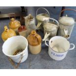 Three metal watering cans (1½, 2 and 2½ gallons), a metal jug with swing handle, an enamelled pail