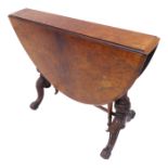 A mid-19th century figured walnut oval dropleaf occasional table; four downswept moulded legs headed