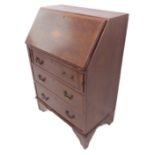 An Edwardian mahogany and satinwood crossbanded writing bureau of small proportions; the sloping