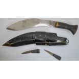 A modern kukri with brass chapri and kanjo - the scabbard with faras and brass khothi. Purchased