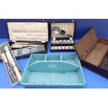 A Thomas Turner 'Encore' carving set (poultry and meat carving knives and forks) and a set of