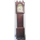An early 19th century oak and mahogany crossbanded eight-day longcase clock; the broken swan-neck