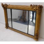 A large late Regency period gilt-framed overmantle mirror with three mirror plates; the top