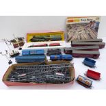 A 1980s Tri-ang Hornby 00 gauge model railway set to include 2 steam engines with coal carts (The