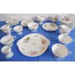 A Shelley Fine Bone China tea service in the 'Wild Flowers' pattern (13668) comprising a two-handled