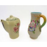 A Susie Cooper coffee pot and a Clarice Cliff jug