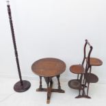 A small furniture group to include an Edwardian folding mahogany cake stand, a small circular oak