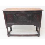 A small oak side cabinet / food hutch in the 17th century style (probably 19th century): the